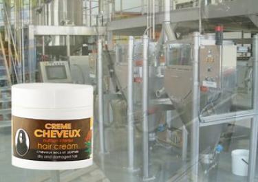 Big bag discharge and dosing of potassium persulphate and sodium persulphate