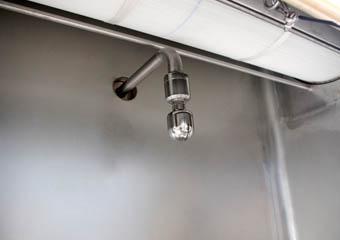 vidange-sacs-automatique-manipulateur-sacs-buse-tete-lavage.png Tête de lavage - Palamatic Process